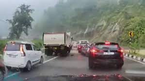 horrific video: 2 people die as huge rocks tumble down a slope and crush cars